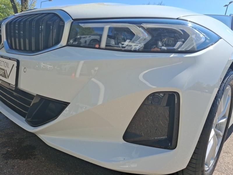BMW 318i Touring von der Seite in Weiß