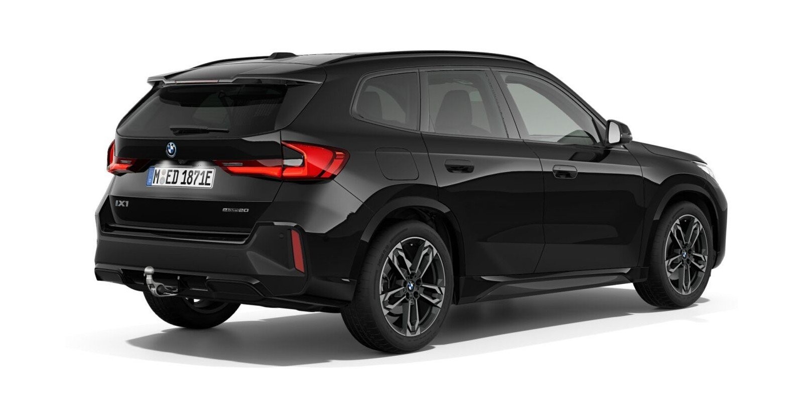 BMW iX1 eDrive20 in Schwarz von hinten