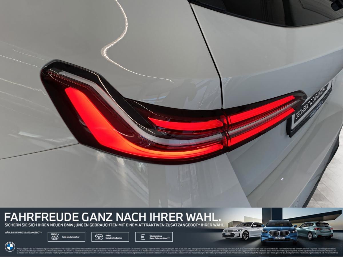 BMW 520d Touring von hinten in Weiß