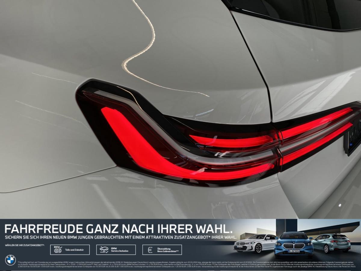 BMW 520d Touring von hinten in Weiß