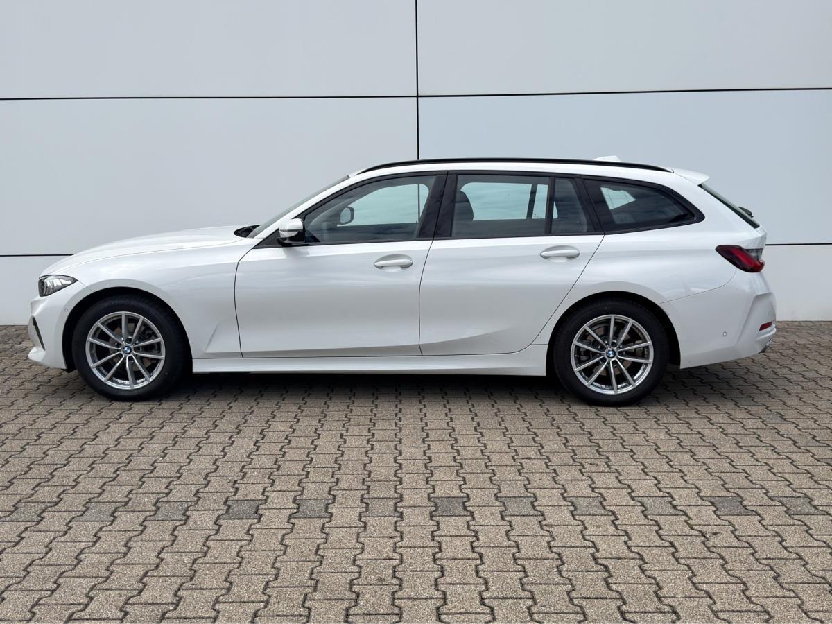 BMW 318i Touring von der Seite in Weiß